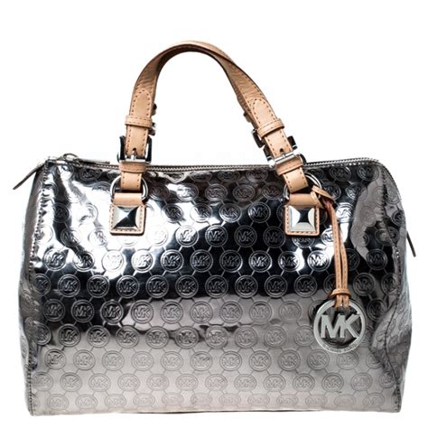 silver purse michael kors|michael kors metallic silver handbags.